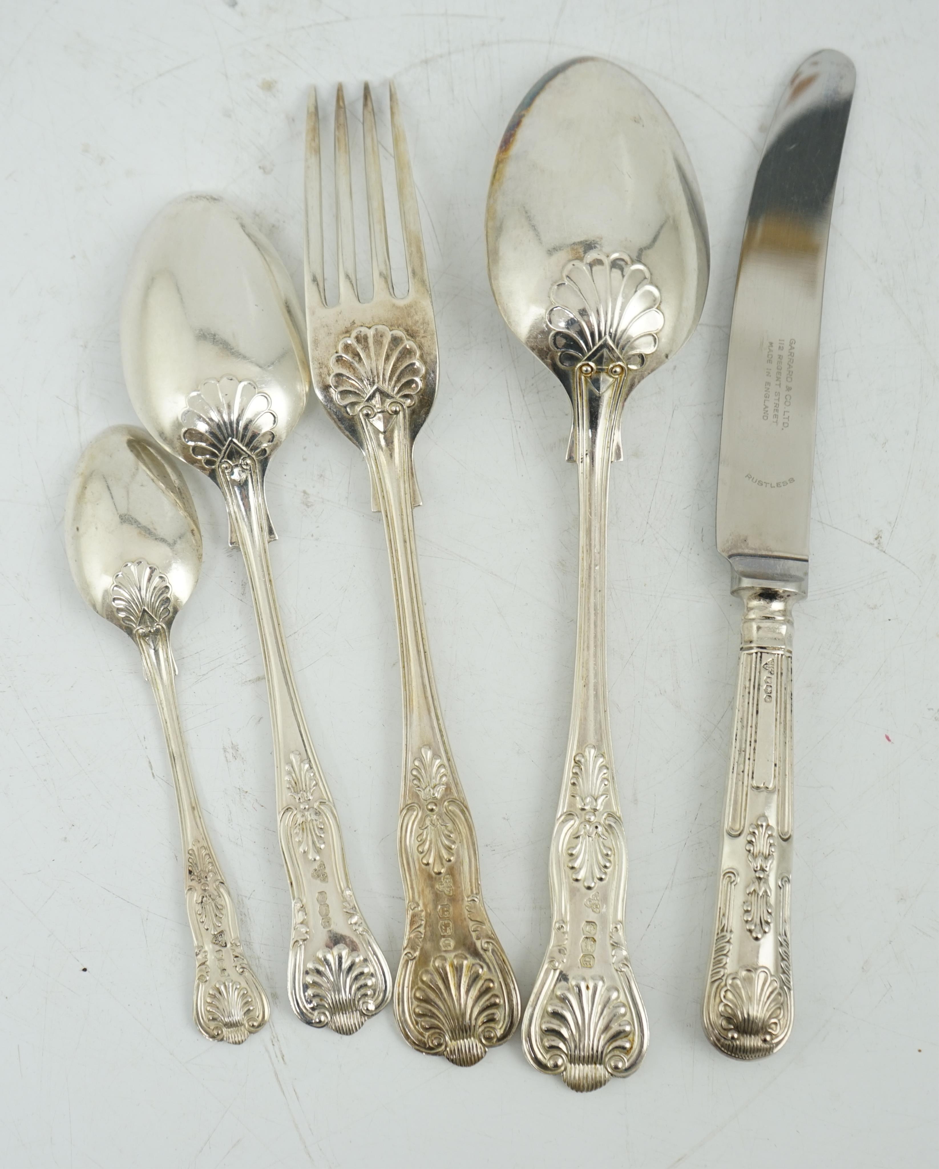 An Elizabeth II canteen of silver King's pattern cutlery for twelve by Garrard & Co Ltd